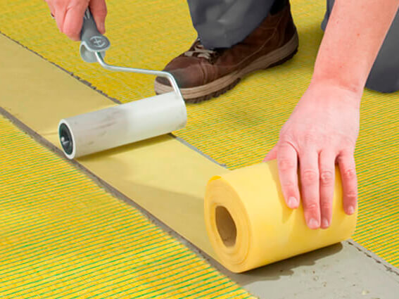 Image of tradesman fitting CI++ Matting